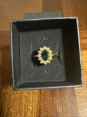 Vintage Gold Halo Ring with Deep Blue Center Stone